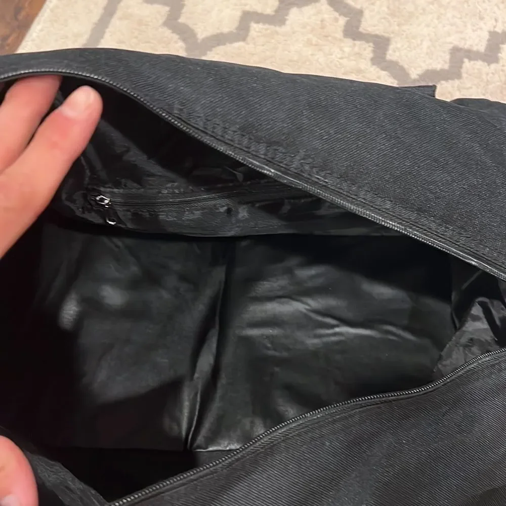 True Religion Black and Red Strap Duffel Bag